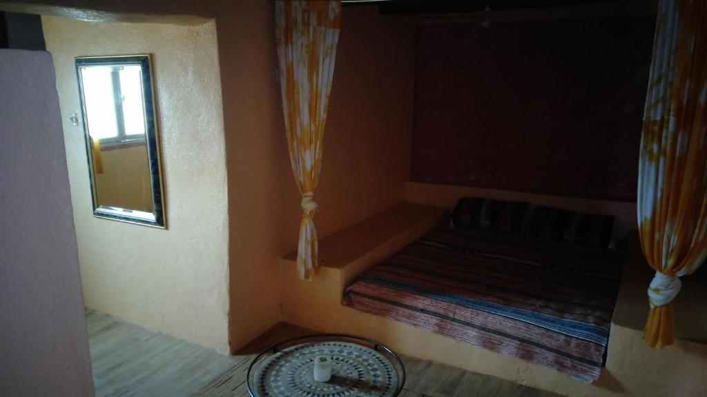 Postel nebo postele na pokoji v ubytování Auberge Aain Nakhla