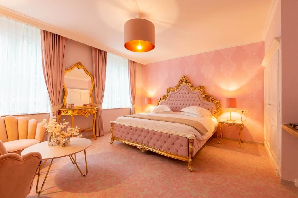 Postel nebo postele na pokoji v ubytování Boutique Hotel Die Swaene