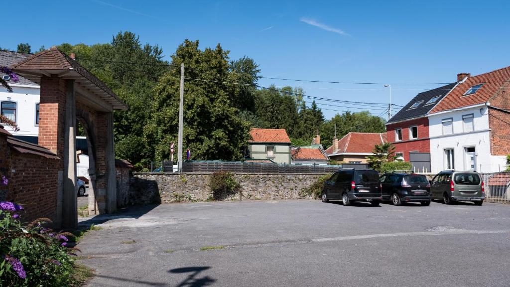 a group of cars parked in a parking lot at B&B El Tyu in Écaussinnes-dʼEnghien