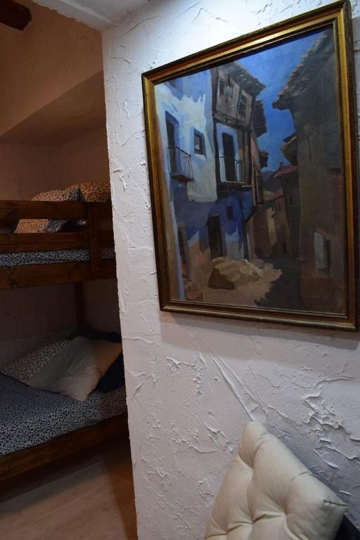 Postel nebo postele na pokoji v ubytování Casa Balcón de Albarracín