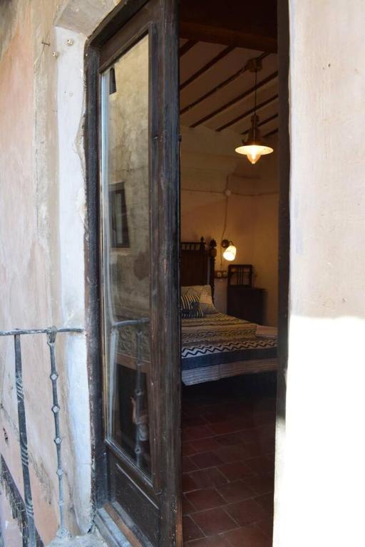 Postel nebo postele na pokoji v ubytování Casa Balcón de Albarracín