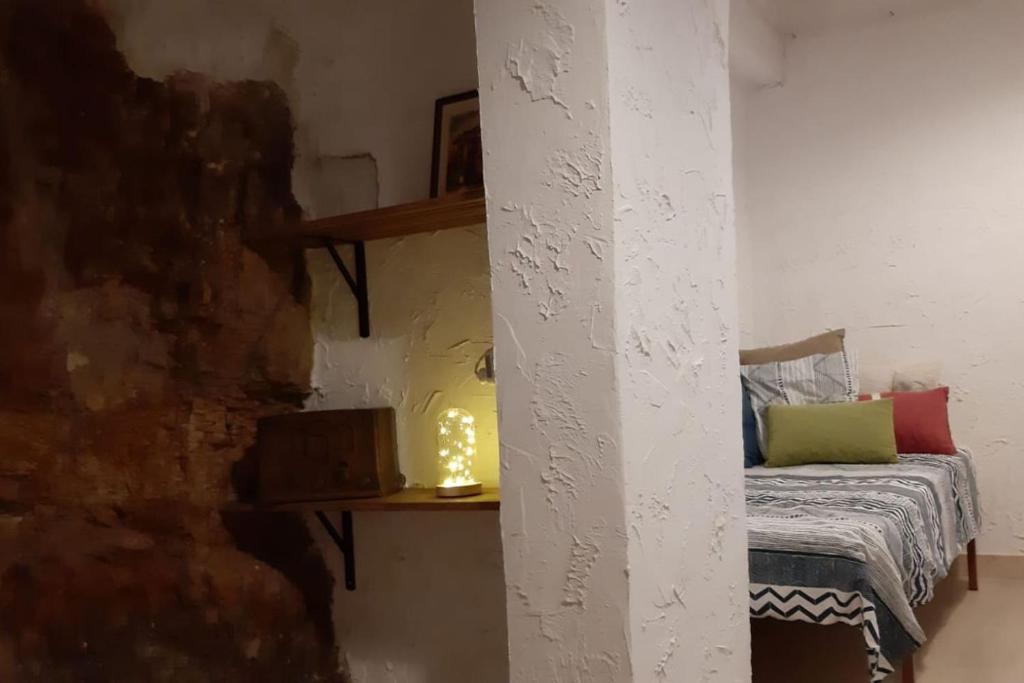 Postel nebo postele na pokoji v ubytování Casa Balcón de Albarracín