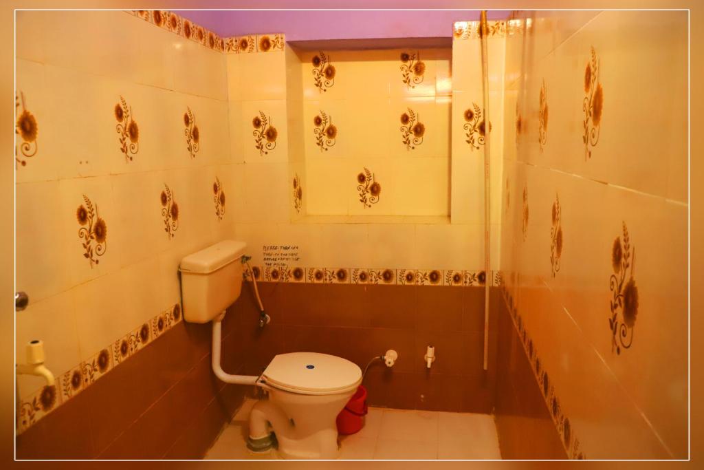 Koupelna v ubytování Hotel Renuka