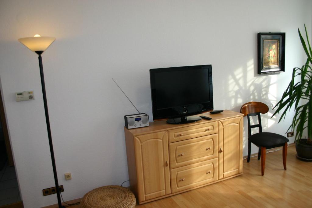 TV a/nebo společenská místnost v ubytování Atrium City