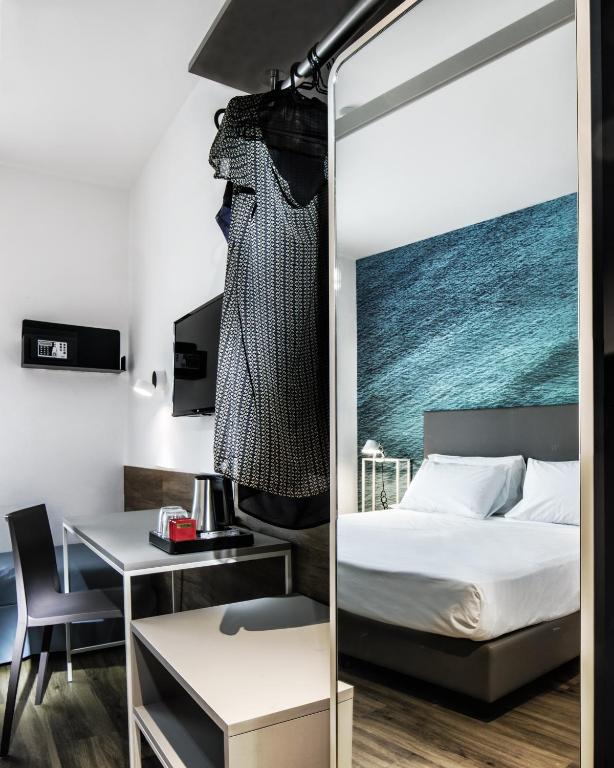 Postel nebo postele na pokoji v ubytování Best Western Hotel Corsi