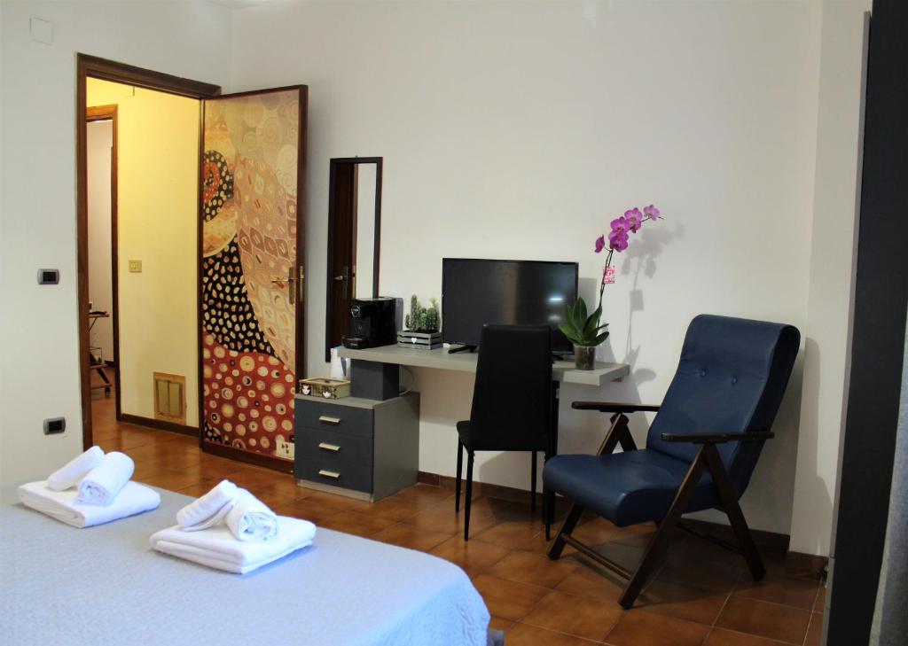 TV a/nebo společenská místnost v ubytování B&B Atlante