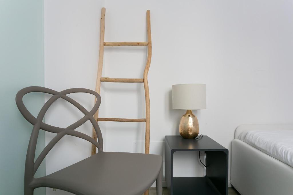 Posteľ alebo postele v izbe v ubytovaní Milanofierapartments