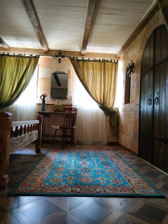 Postel nebo postele na pokoji v ubytování Hye Aspet Հայ Ասպետ