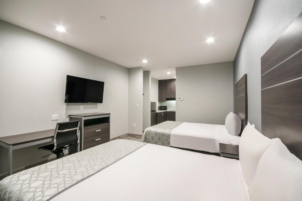 Americas Best Value Inn & Suites Northeast Houston Downtown I-610 - Suite Con 2 Camas Queen Y Cocina