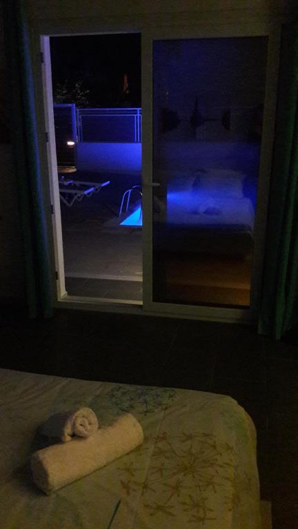 Postel nebo postele na pokoji v ubytování Villa Elpiniki