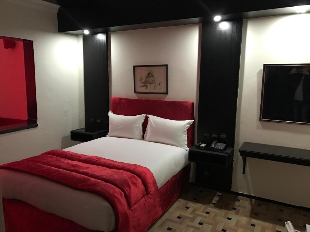 Postel nebo postele na pokoji v ubytování Hotel Al Khaima