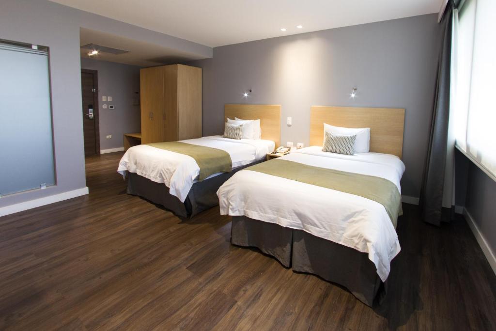 Postel nebo postele na pokoji v ubytování Unipark by Oro Verde Hotels