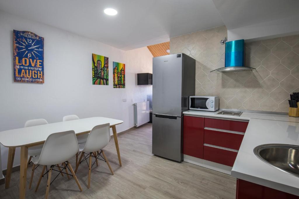 Kuchyň nebo kuchyňský kout v ubytování Apartamentos Cáceres Turístico