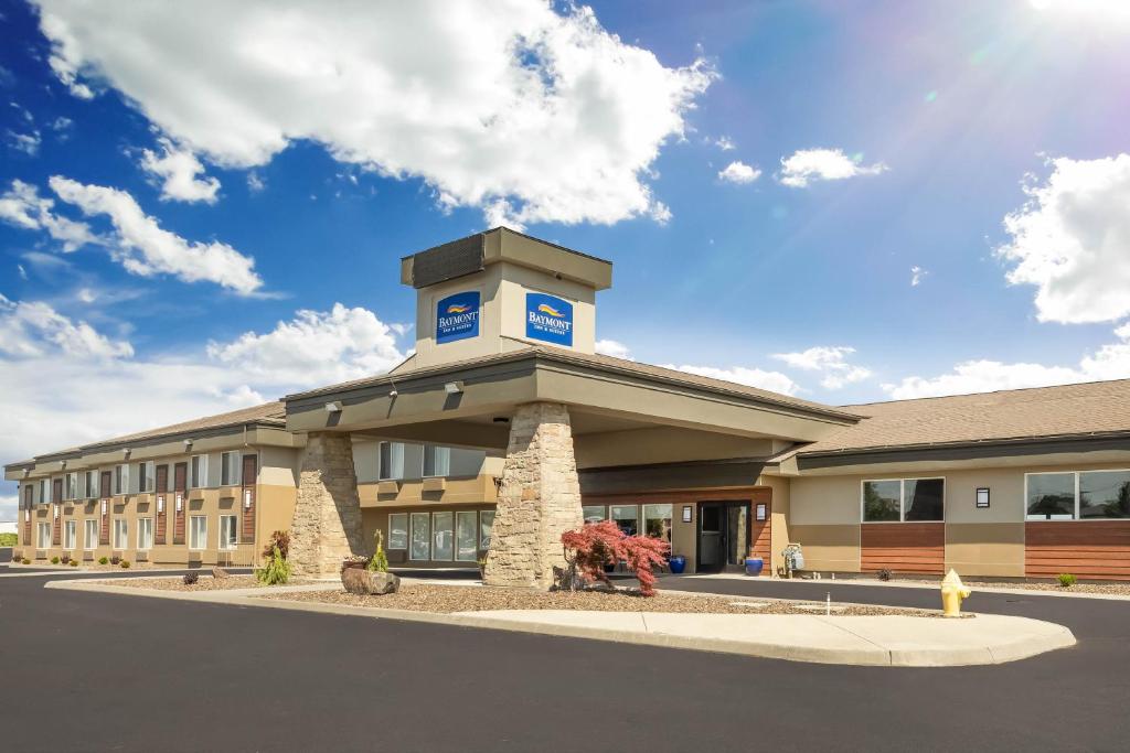 a building with a clock tower on top of it at Baymont by Wyndham Tri-Cities/Kennewick WA in Kennewick