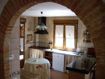 A kitchen or kitchenette at Refugio La Covatilla I,II,III y IV