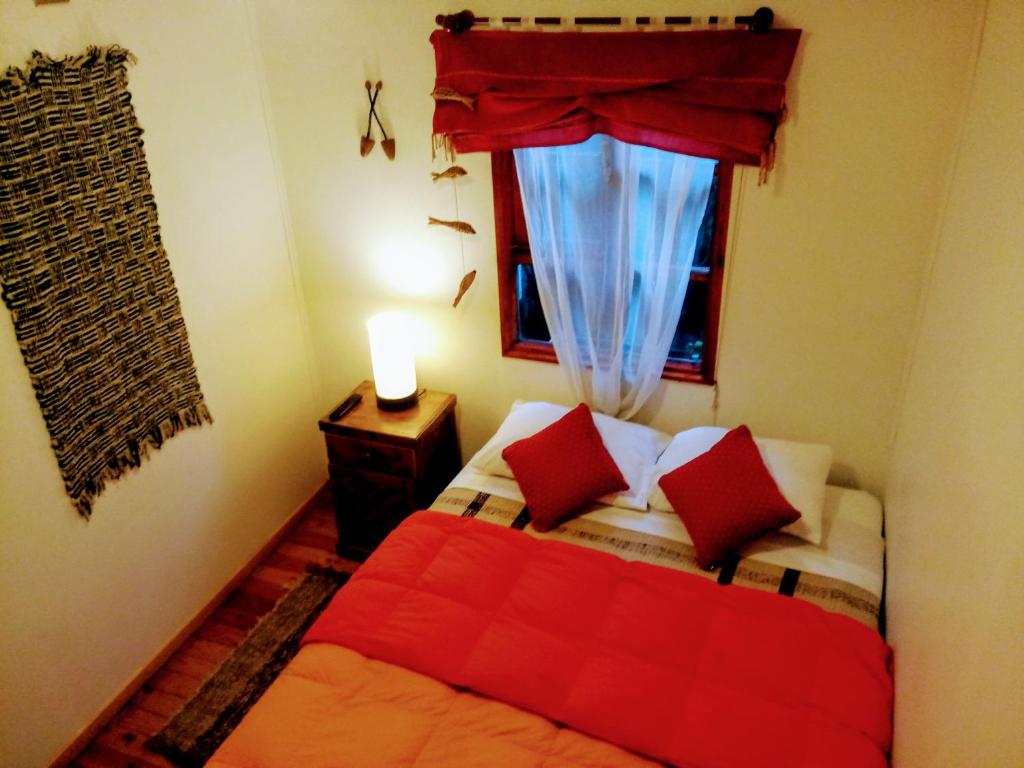 Postel nebo postele na pokoji v ubytování Hostal Torre de Babel