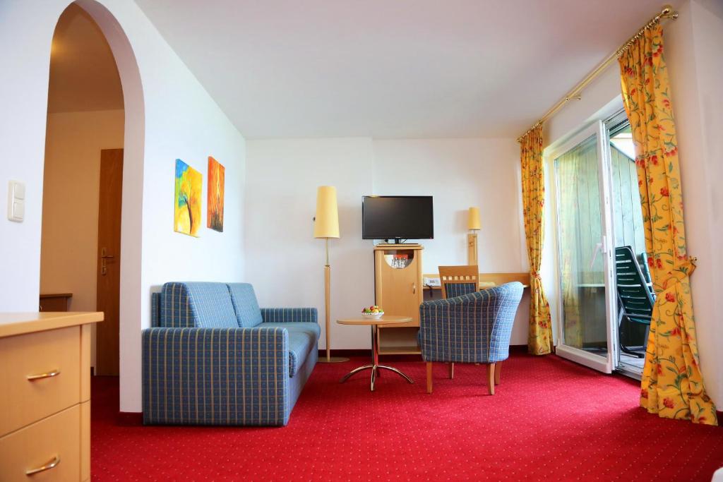 TV o dispositivi per l'intrattenimento presso Seegasthof Hois'n Wirt - Hotel mit Wellnessbereich