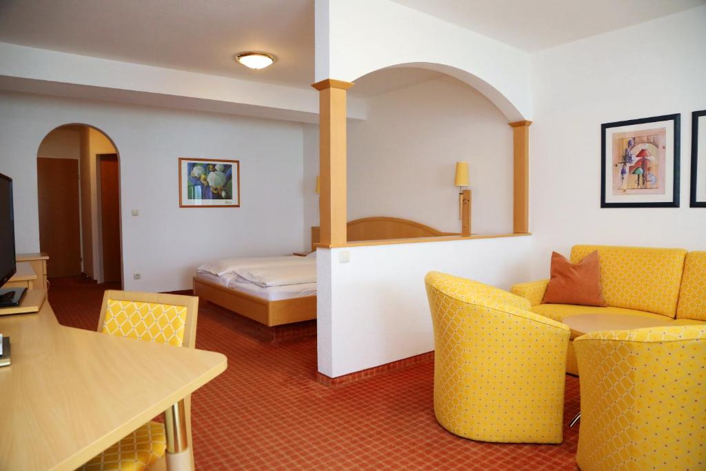 Letto o letti in una camera di Seegasthof Hois'n Wirt - Hotel mit Wellnessbereich