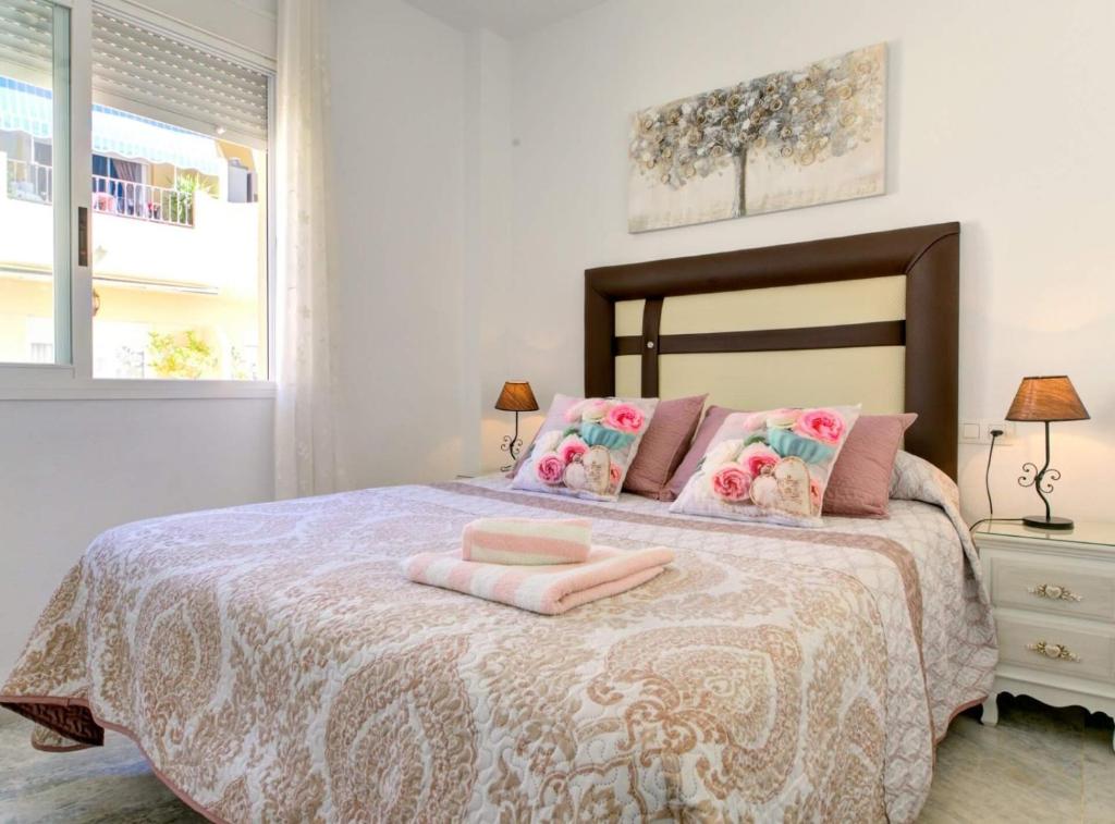 Posteľ alebo postele v izbe v ubytovaní APARTAMENTO VIÑUELA