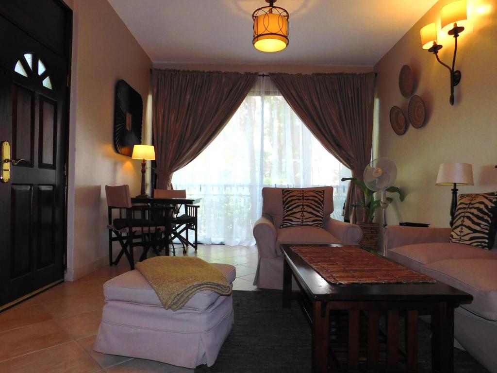 Posezení v ubytování Palacina The Residence & The Suites