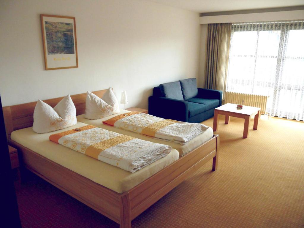 Postel nebo postele na pokoji v ubytování Hotel Fortuna