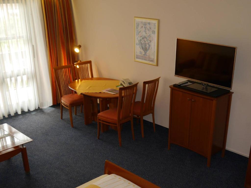 TV a/nebo společenská místnost v ubytování Hotel Fortuna