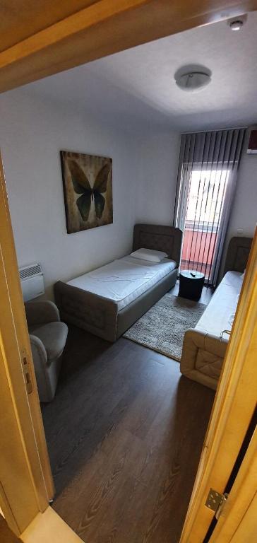 Postel nebo postele na pokoji v ubytování Olympic Wellness & Spa Hotel