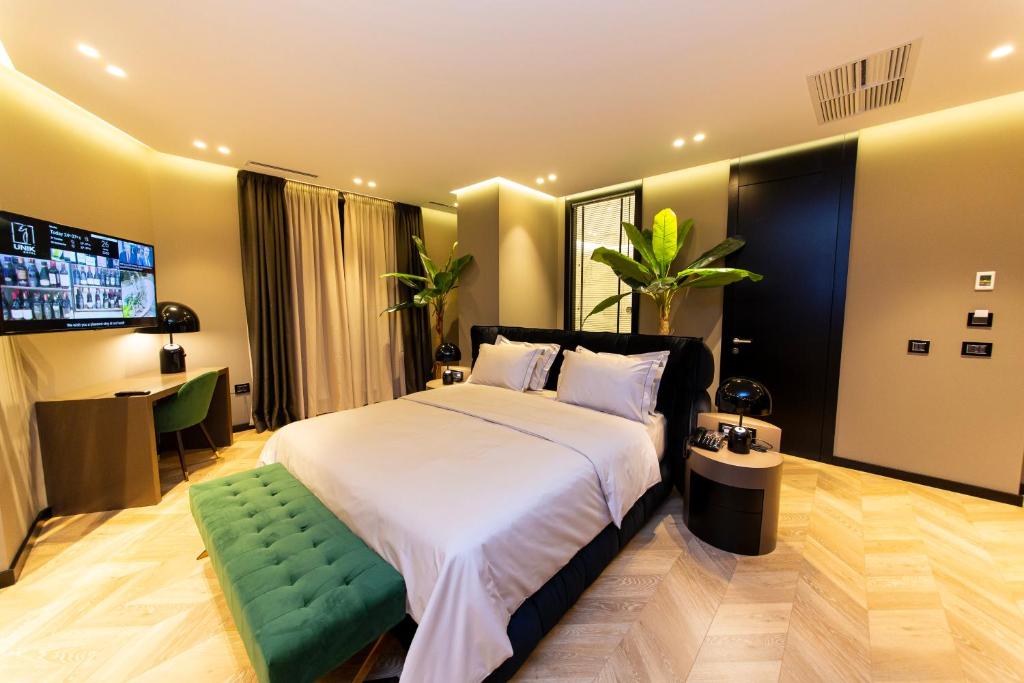 Postel nebo postele na pokoji v ubytování Hotel Unik