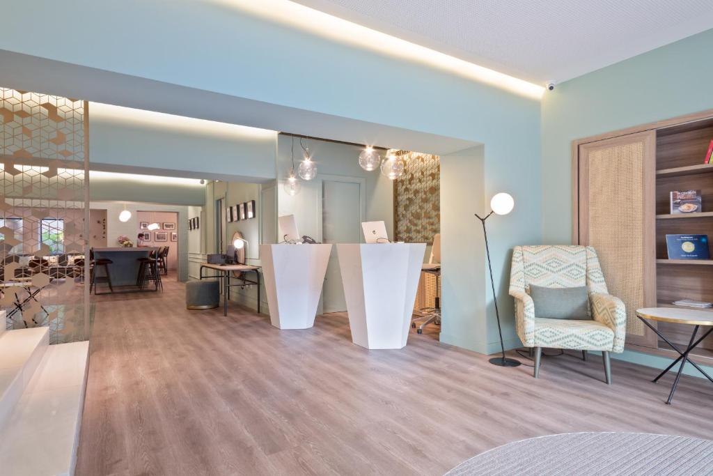 Posezení v ubytování Hotel Via Augusta