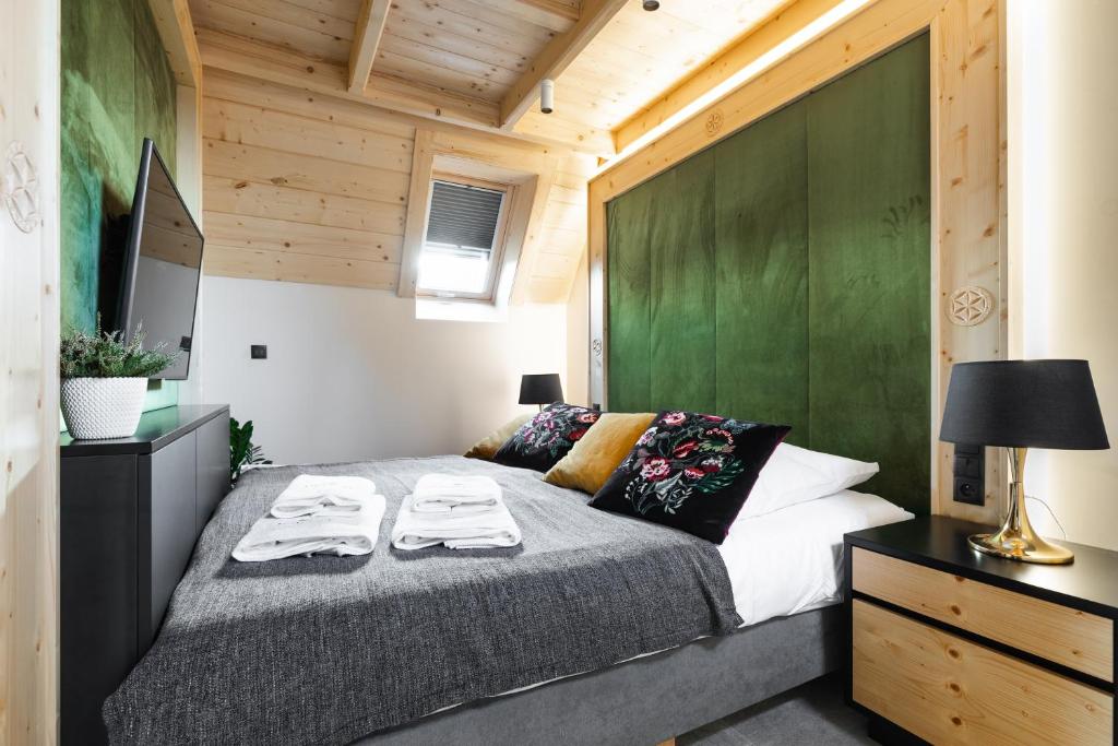 Posteľ alebo postele v izbe v ubytovaní Antałówka Apartments Zakopane