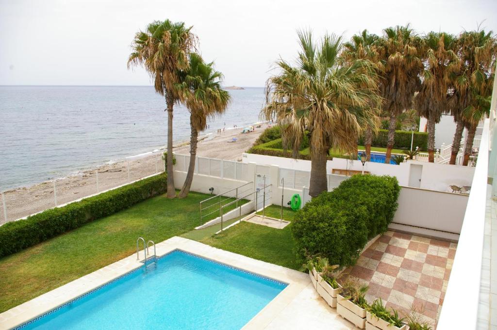 an overhead view of a swimming pool next to the beach at ¡¡NAUTILUS HIGH QUALITY!! in Carboneras