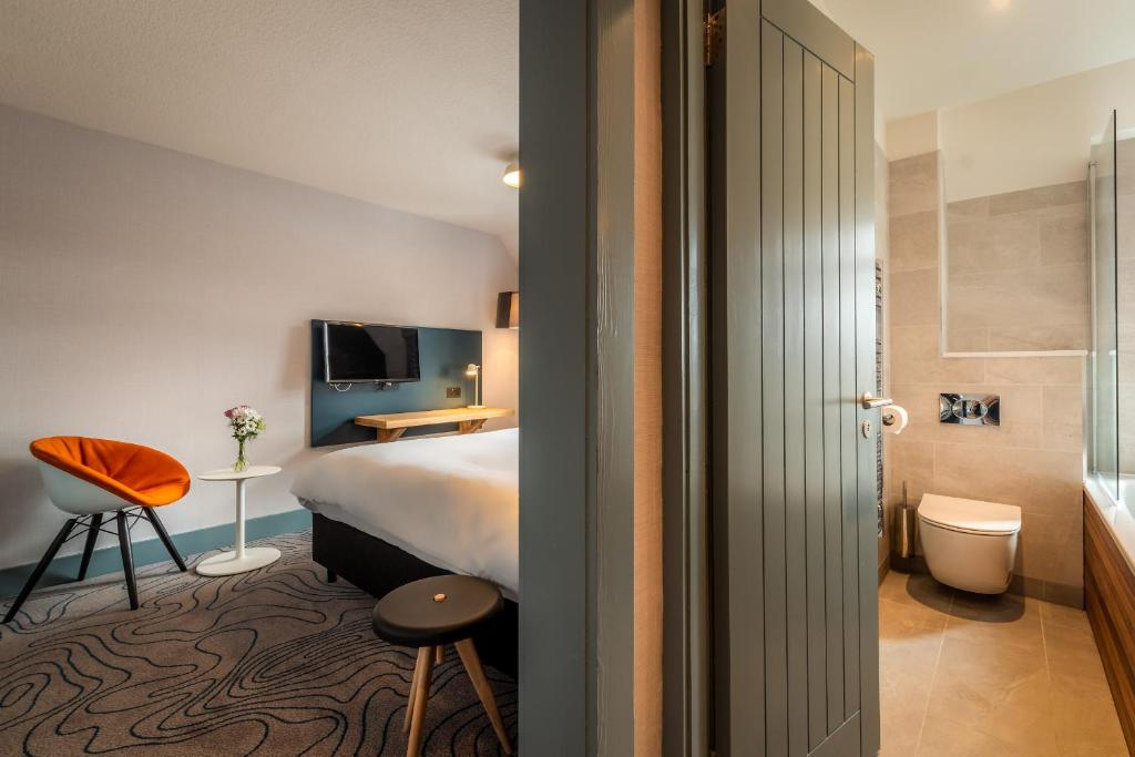 Postel nebo postele na pokoji v ubytování Sligachan Hotel