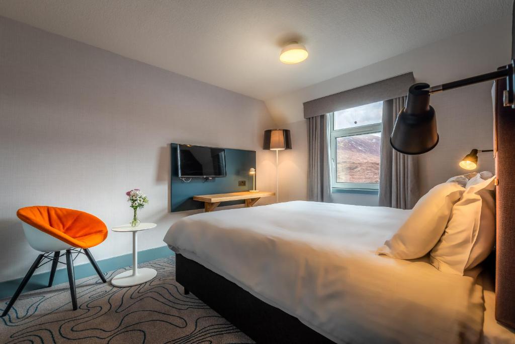 Postel nebo postele na pokoji v ubytování Sligachan Hotel