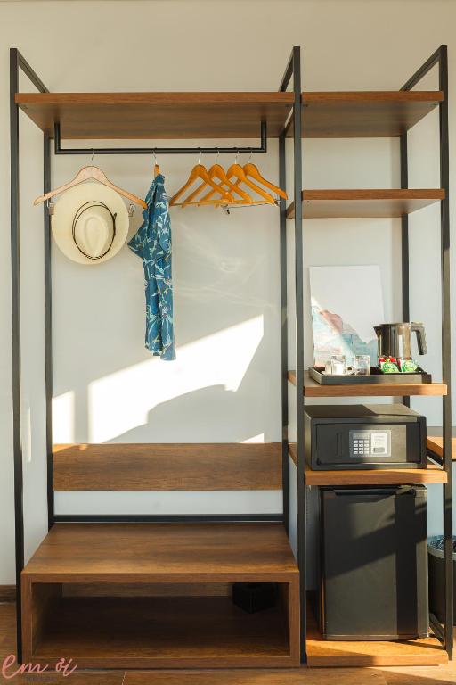 Postel nebo postele na pokoji v ubytování Em Oi Boutique Hotel