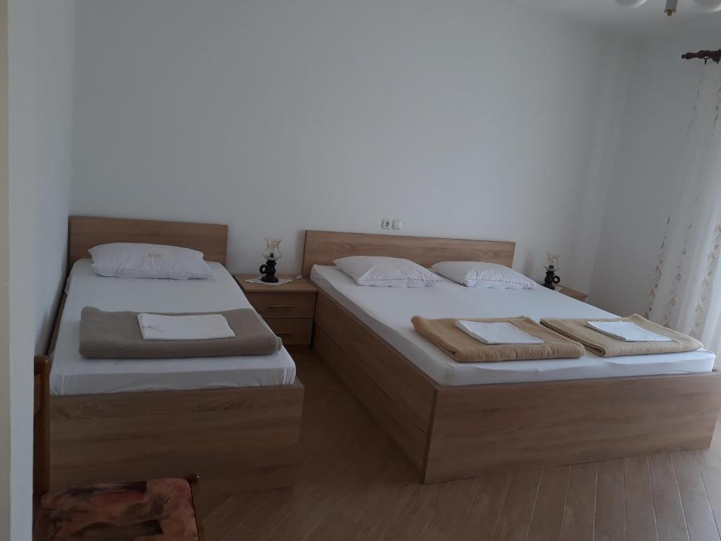 Postel nebo postele na pokoji v ubytování Apartments Beg