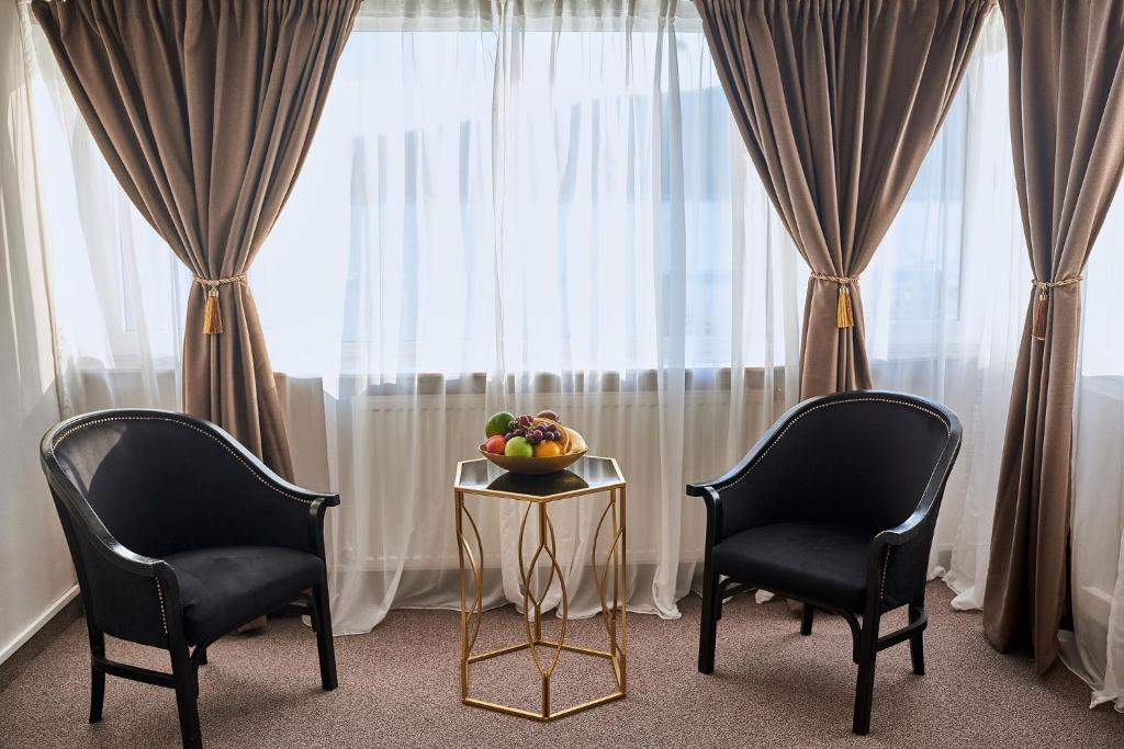 Posezení v ubytování Riviera by Queens Hotel and Resort