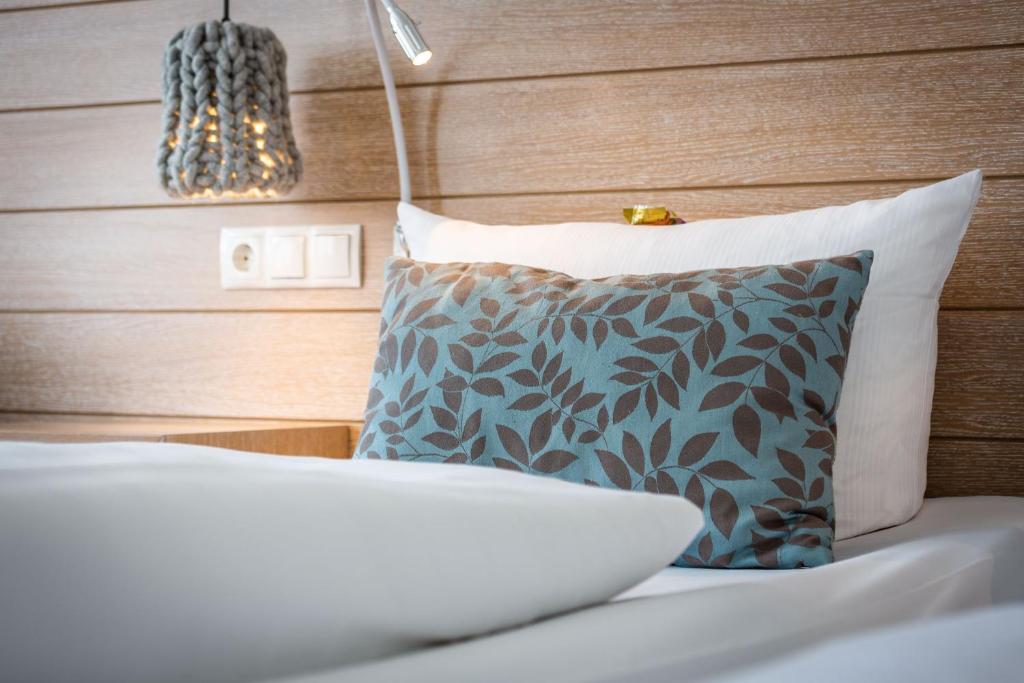 Postel nebo postele na pokoji v ubytování Hotel Der Seehof