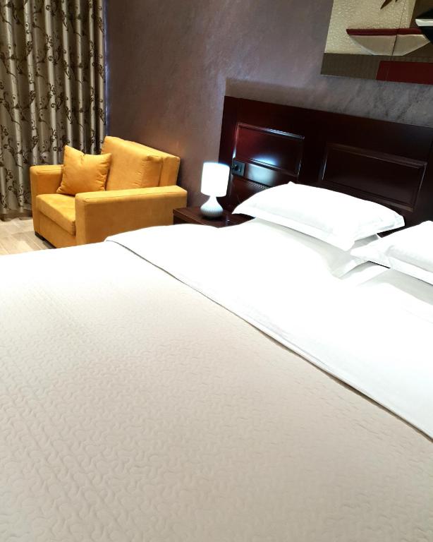 Postel nebo postele na pokoji v ubytování Comfort Hotel