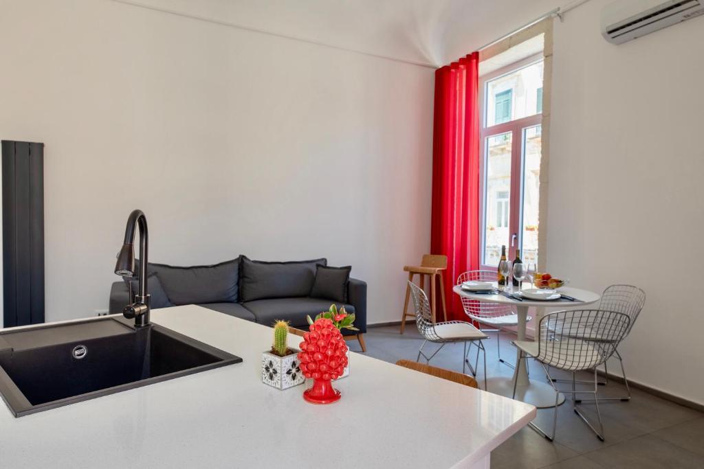 Posedenie v ubytovaní Ortigia Fab Apartment