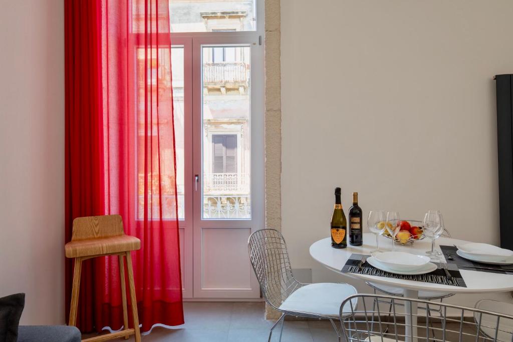 Nápoje v ubytovaní Ortigia Fab Apartment
