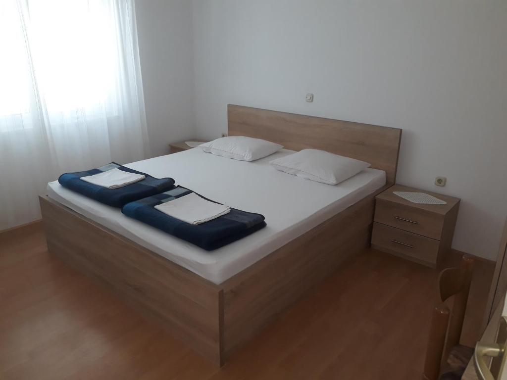 Postel nebo postele na pokoji v ubytování Apartments Beg