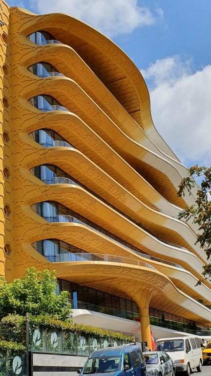 a building with cars parked in front of it at Taksim leylak suite in Istanbul