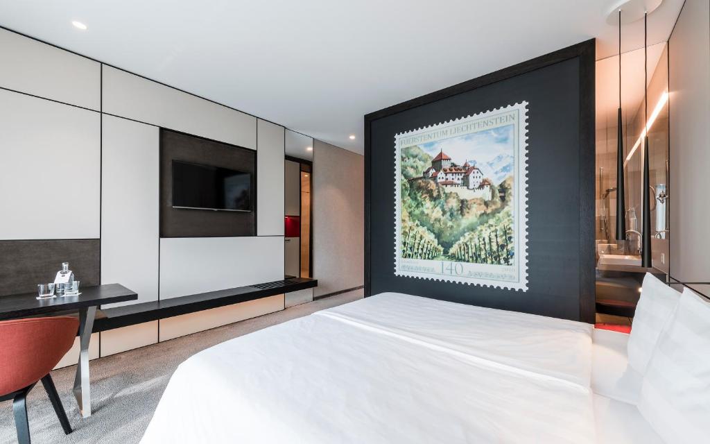 Postel nebo postele na pokoji v ubytování b-smart hotel Bendern