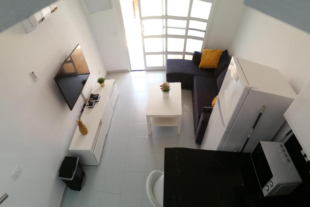an overhead view of a bathroom and a living room at bungalow with terrace near the beach in San Bartolomé