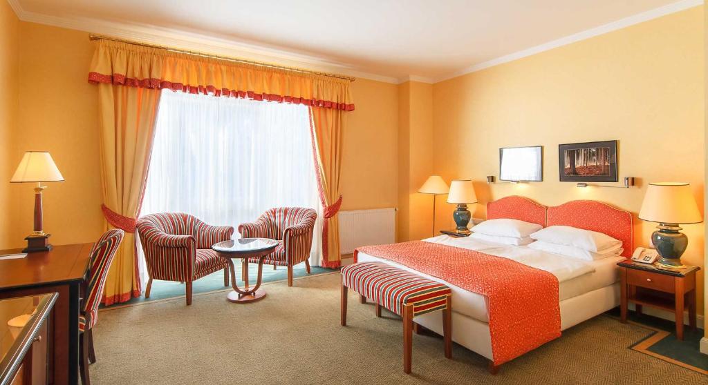 Postel nebo postele na pokoji v ubytování Dvorak Spa & Wellness