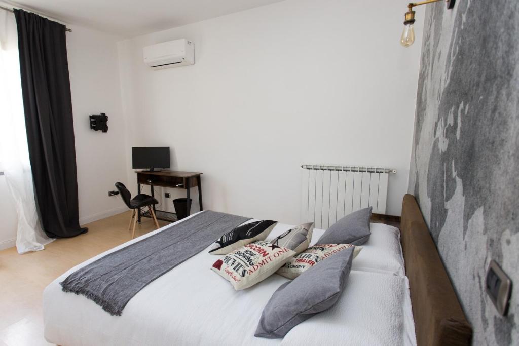 Postel nebo postele na pokoji v ubytování GUEST HOUSE IL LEONE
