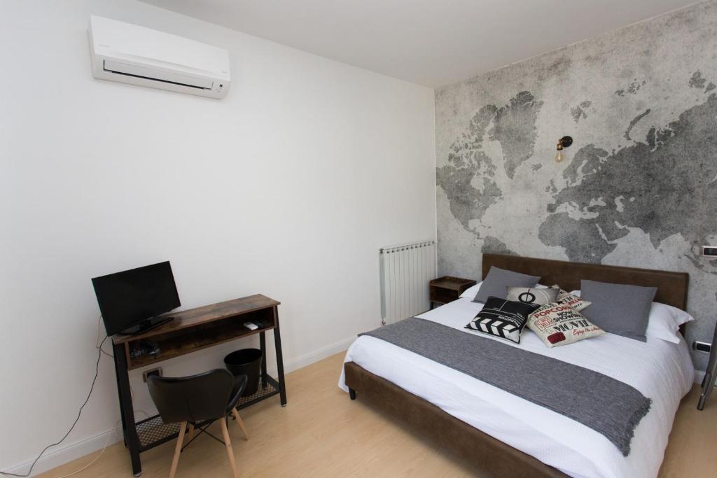 Postel nebo postele na pokoji v ubytování GUEST HOUSE IL LEONE