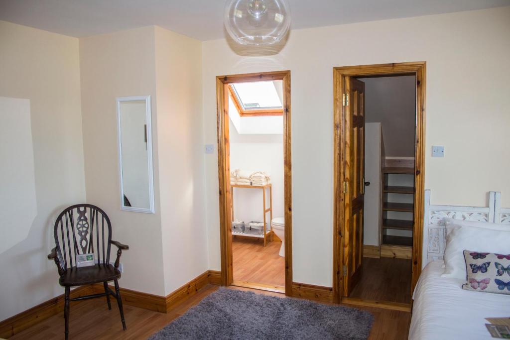 Postel nebo postele na pokoji v ubytování Madra Rua Organic Accommodation