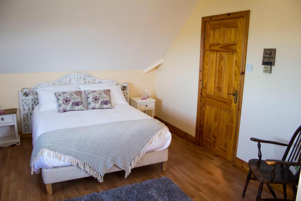 Postel nebo postele na pokoji v ubytování Madra Rua Organic Accommodation
