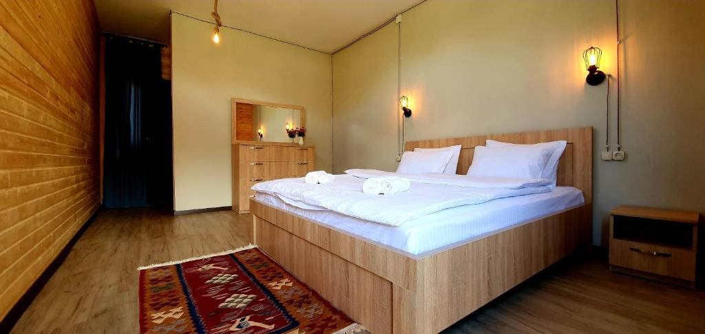 Letto o letti in una camera di Hotel Migu Yard